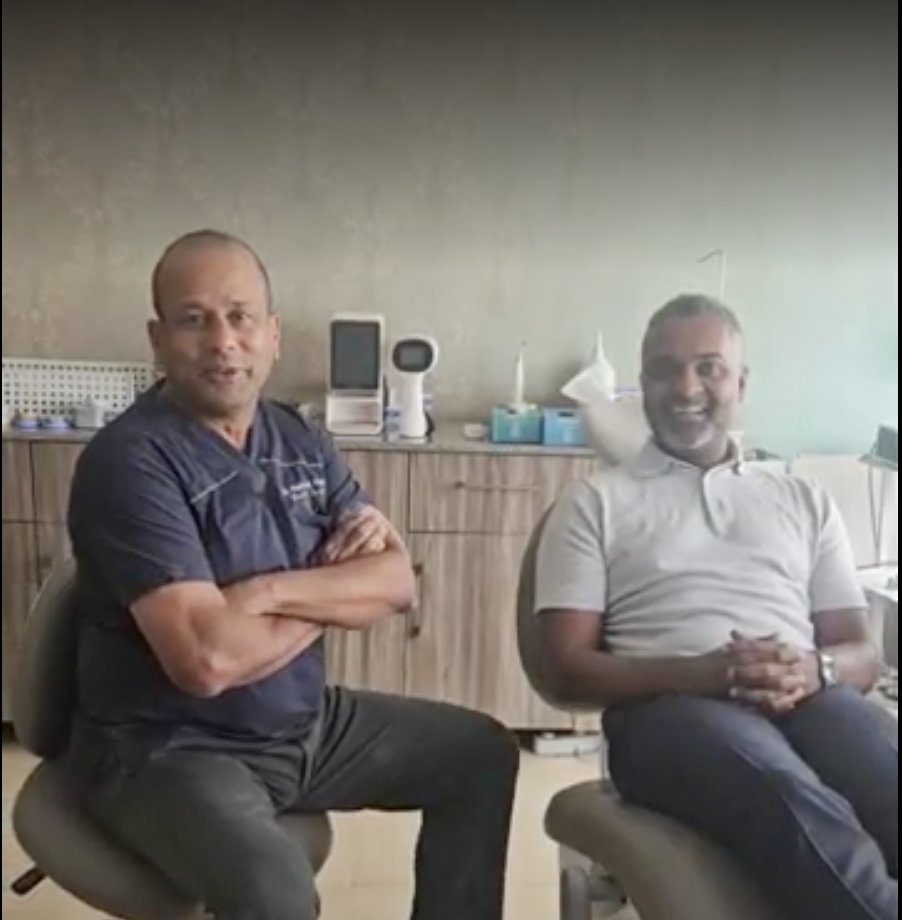 Patient and doctor after successful treatment